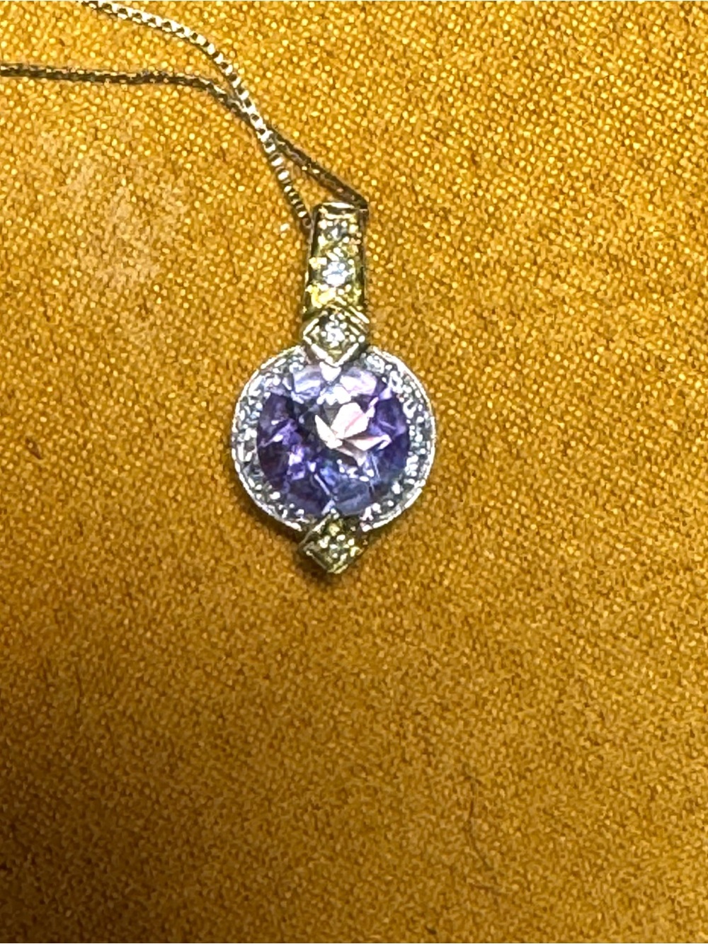 Hugett 18kt White and Yellow Gold Diamond and Amethyst Necklace.